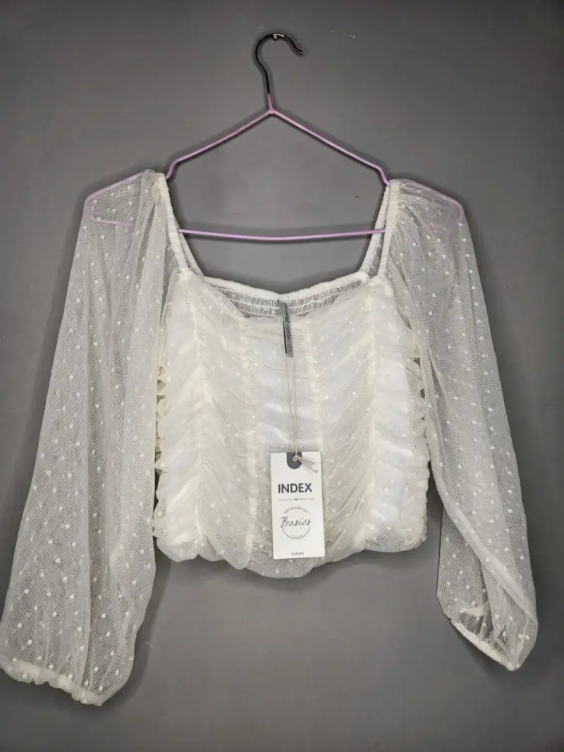Blusa de encaje blanco con mangas largas Index
