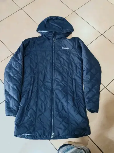 Chaqueta Columbia azul con capucha para mujer - miniatura 1
