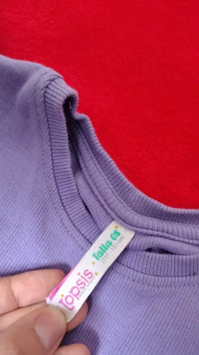 Polera lila con volantes para niña - miniatura 2