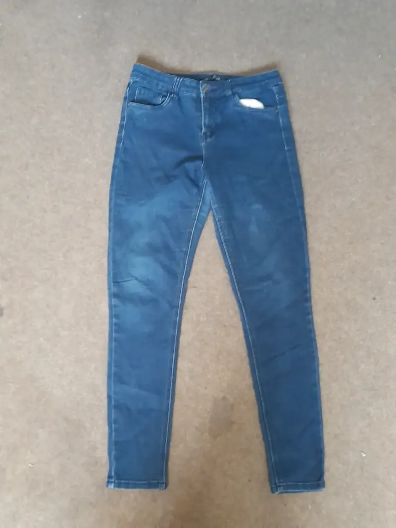 Jeans ajustados azul oscuro para mujer