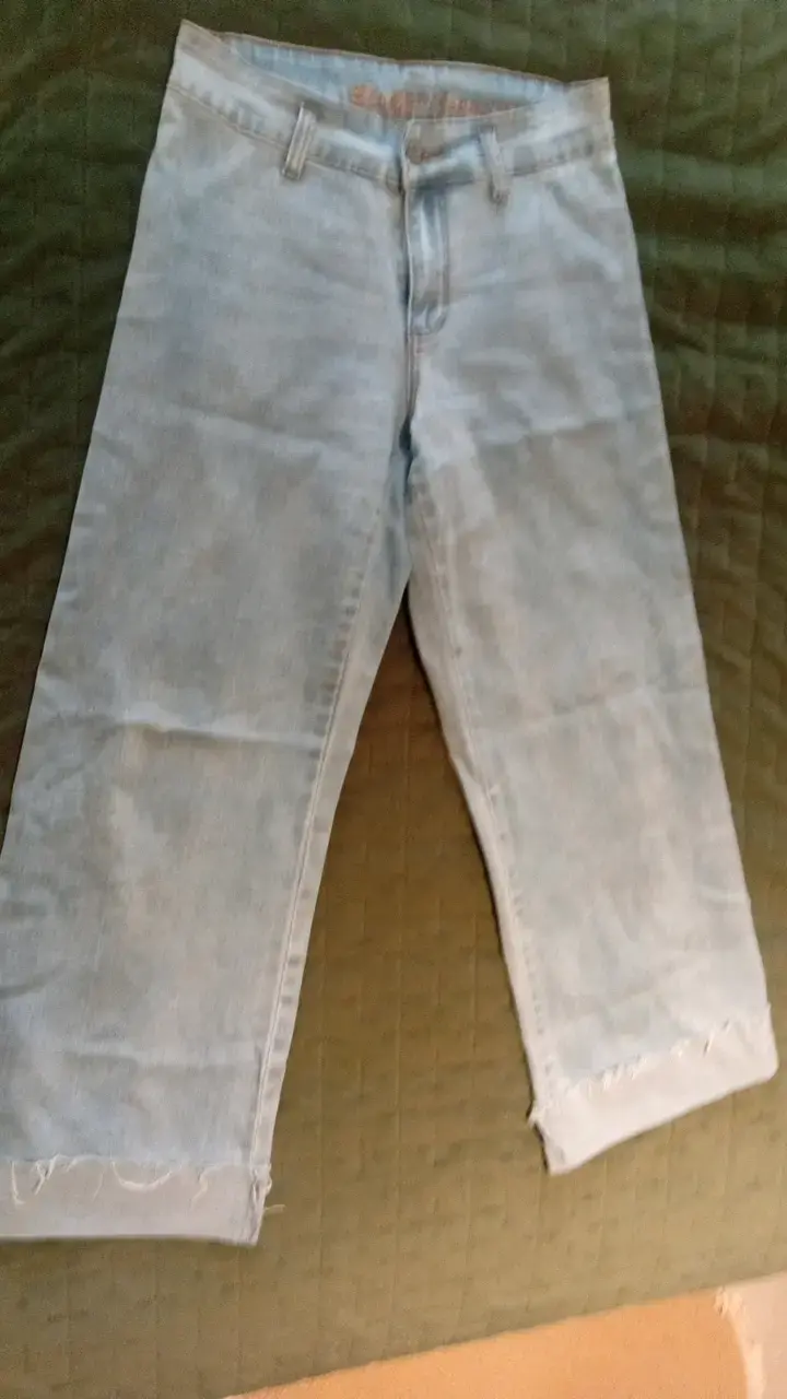 Jeans de mezclilla azul claro desgastados - 1