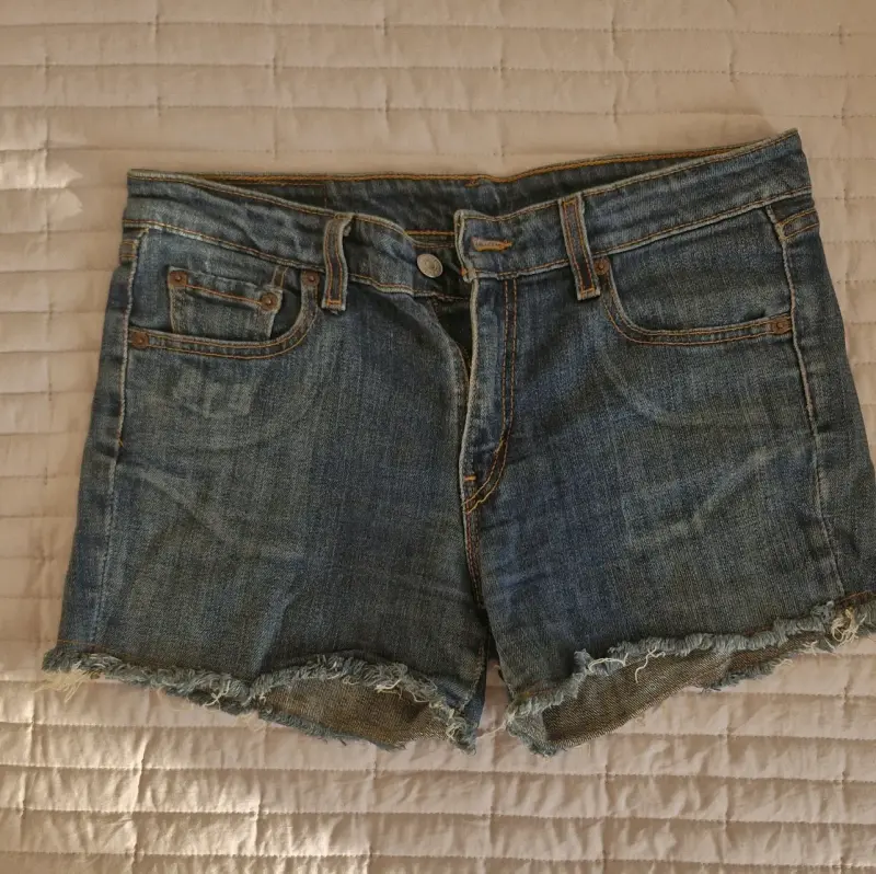 Shorts de mezclilla para mujer desgastados
