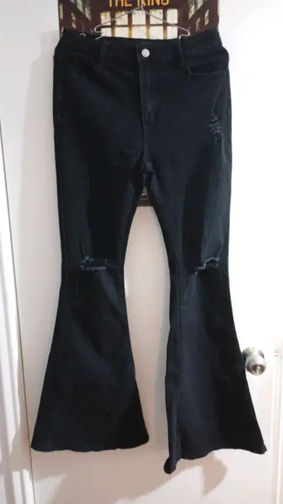 Pantalones acampanados negros con roturas - miniatura 1