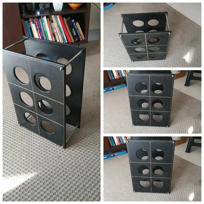 Revistero de cuero negro con diseño moderno