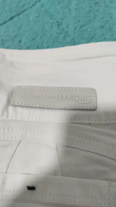 Pantalones blancos de mujer - miniatura 3