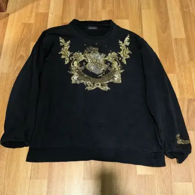 Polerón negro Zara Men con bordado dorado - miniatura 1
