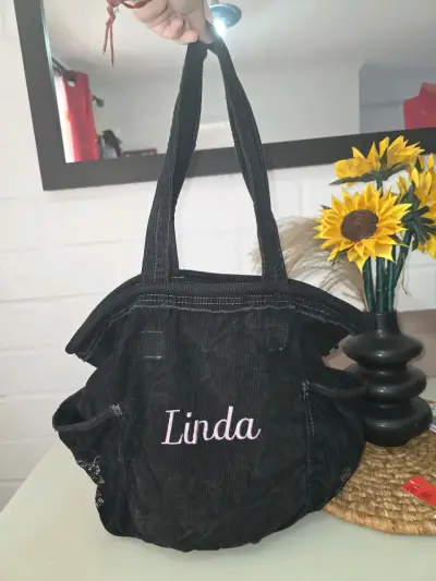 Bolso negro de tela con diseño 'Linda' - miniatura 1