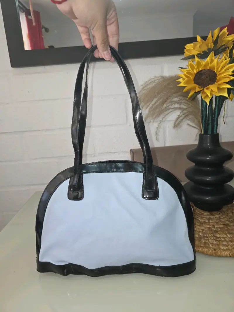 Bolso de mano bicolor con asas largas - 1