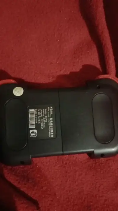 Control inalámbrico para smartphone rojo y negro - miniatura 2