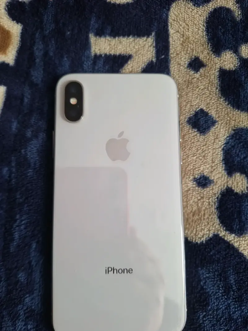 iPhone X con pantalla dañada - 1