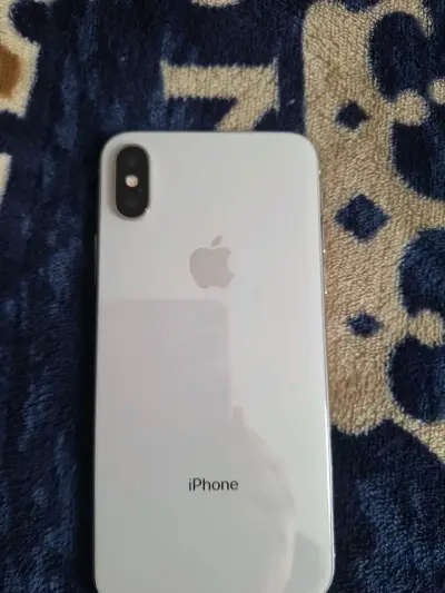 iPhone X con pantalla dañada - miniatura 1
