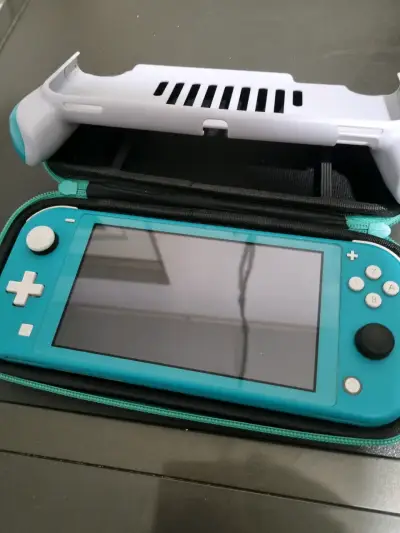 Nintendo Switch Lite Mágica - miniatura 1