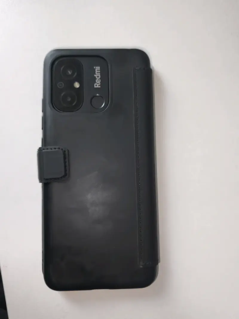 Smartphone Xiaomi Redmi 12C con funda protectora - 5