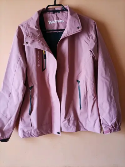 Chaqueta impermeable rosa Wild Travel XL - miniatura 1
