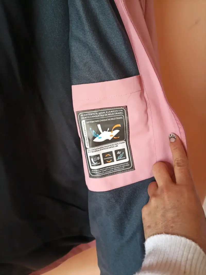 Chaqueta impermeable rosa Wild Travel XL - 3