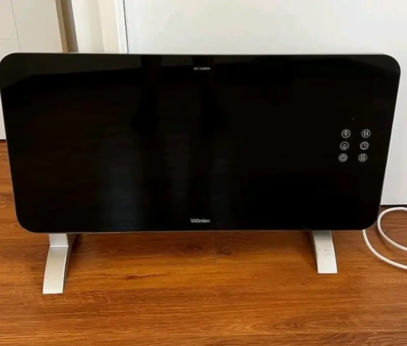 Calefactor eléctrico Warden de vidrio negro