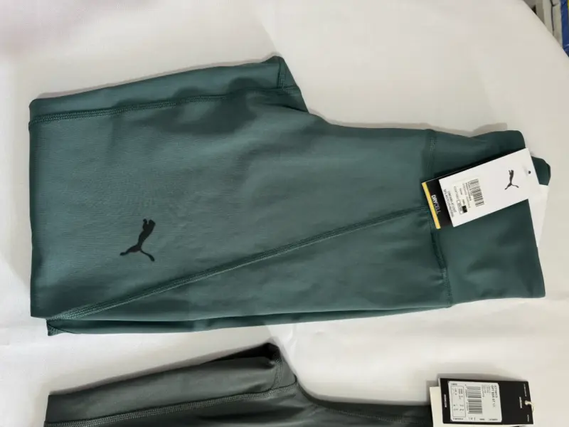 Leggings deportivos verdes Puma Essentials - 2