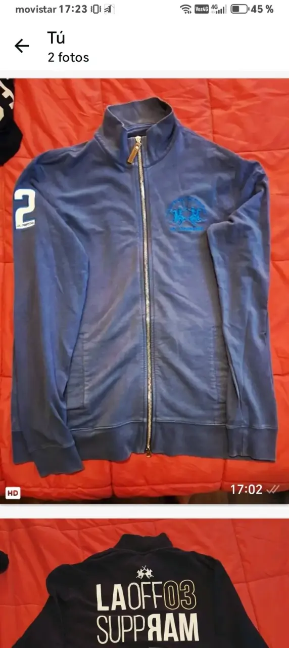 Chaqueta azul con cierre y diseño deportivo