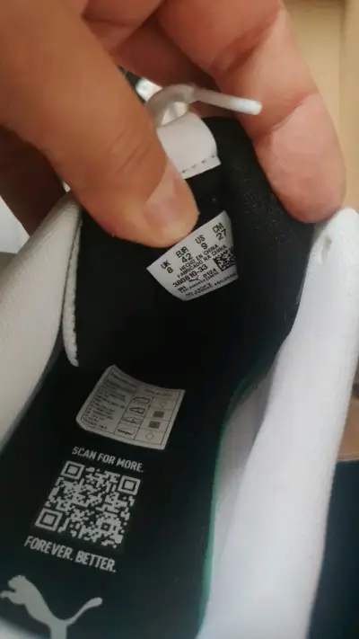 Zapatillas deportivas Puma blancas y negras - miniatura 2