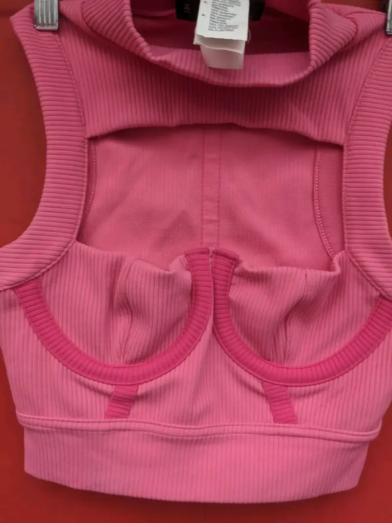 Top deportivo rosa sin mangas Reebok
