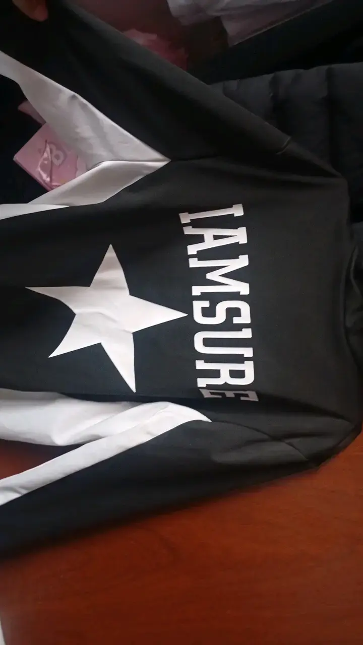 Chaqueta deportiva negra con estrella blanca - 2