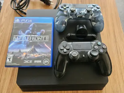 PS4 Slim 1 Tb. + 2 joysticks + juego - miniatura 1