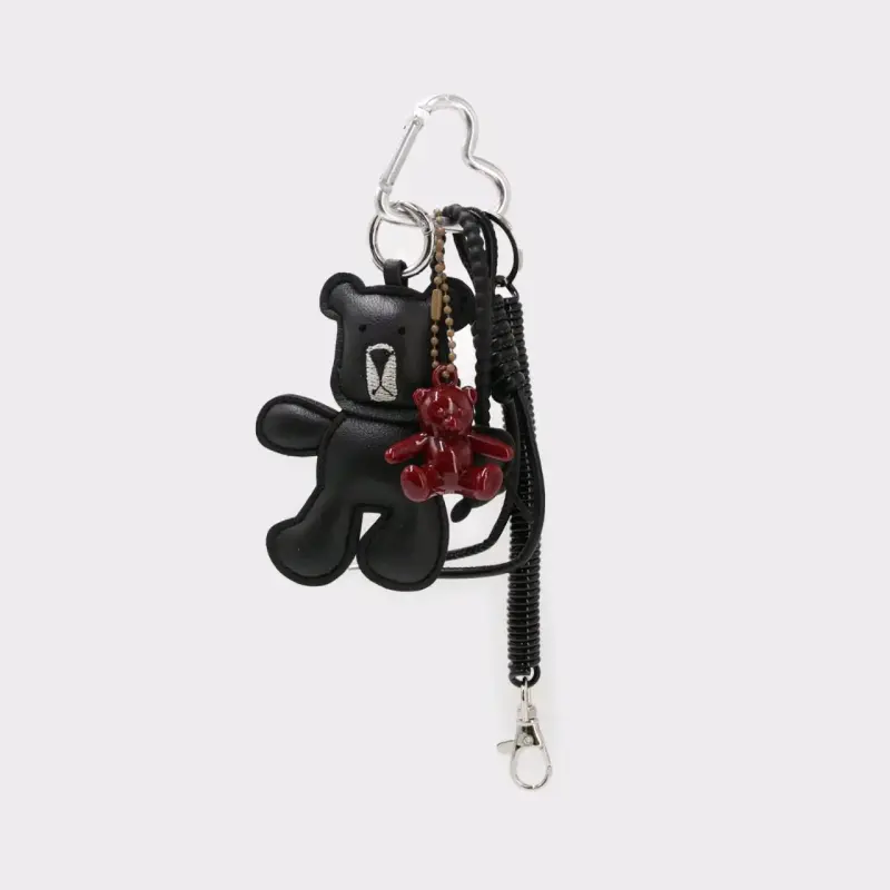 Llavero de osito negro con colgante rojo
