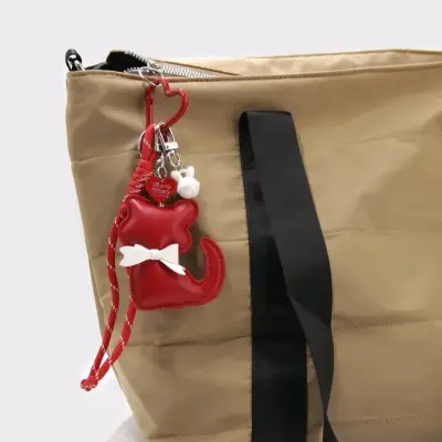 Llavero de gato rojo con lazo blanco - miniatura 2
