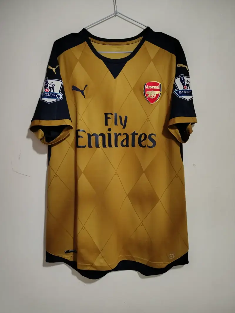 Camiseta Arsenal Puma dorada temporada 2015/16 - 1