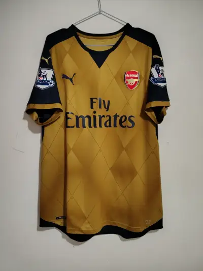 Camiseta Arsenal Puma dorada temporada 2015/16 - miniatura 1