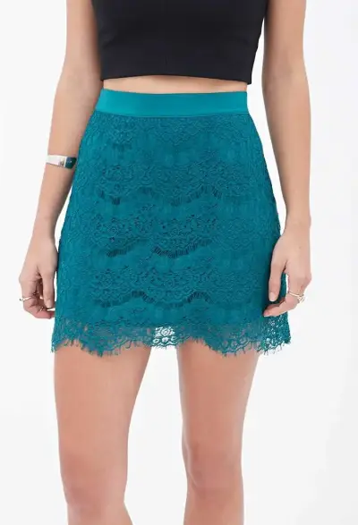Falda corta de encaje verde para mujer - miniatura 1