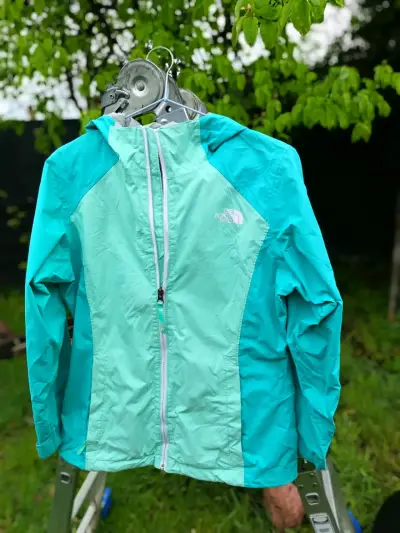 Chaqueta impermeable The North Face turquesa - miniatura 1
