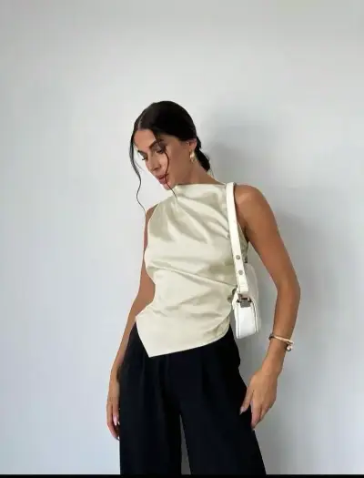 Blusa sin mangas color crema elegante - miniatura 1