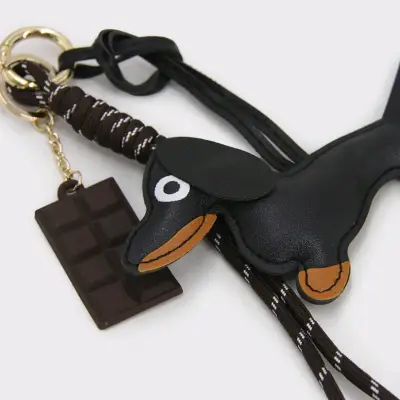 Llavero de perro salchicha con detalle de chocolat - miniatura 1