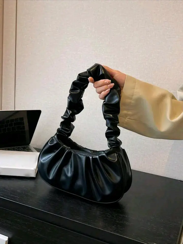 Cartera de mano negra y blanca elegante - 1