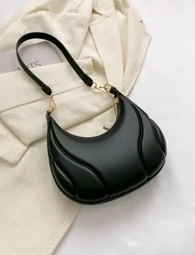 Cartera de mano negra y blanca elegante - miniatura 4