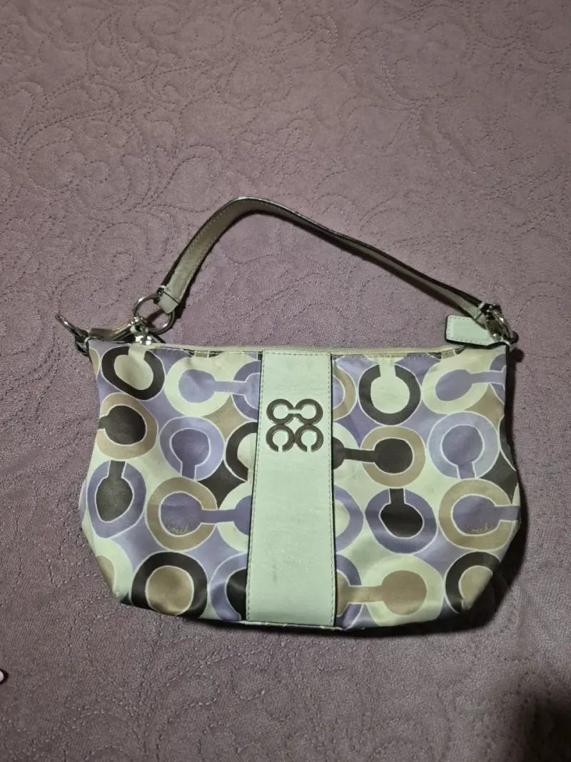 Cartera de mano Coach con diseño geométrico - 1