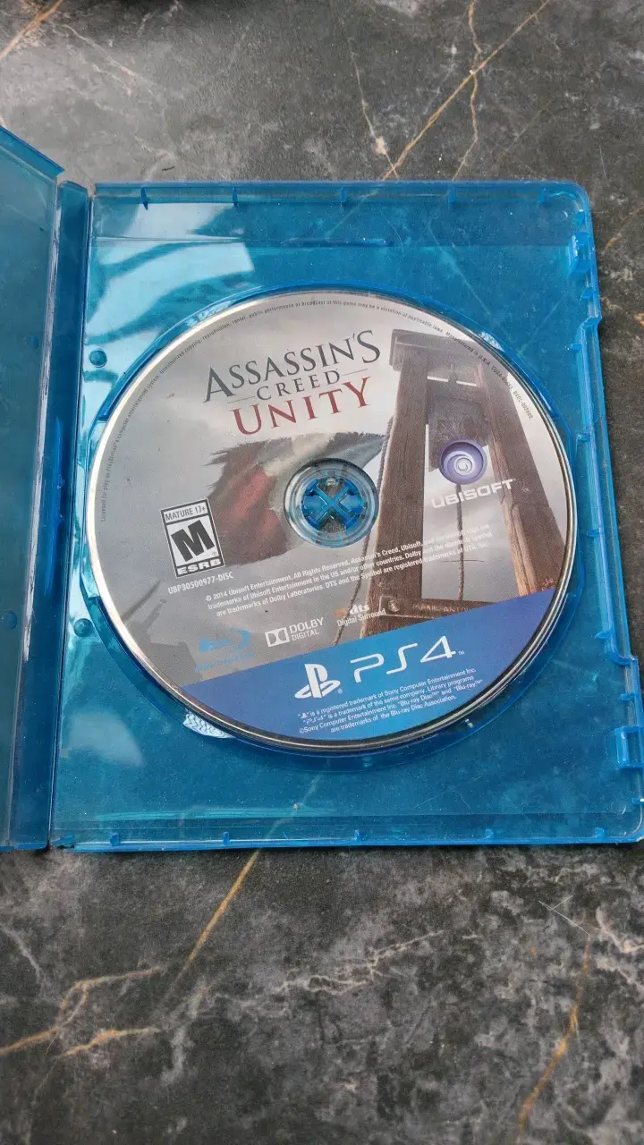 Lote de juegos PS4: Assassin's Creed Unity, The Evil Within 2, PES 2019, FIFA 15 - 1