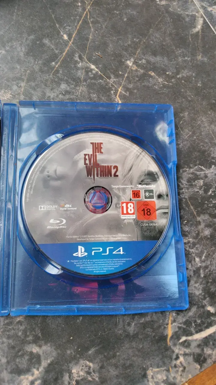 Lote de juegos PS4: Assassin's Creed Unity, The Evil Within 2, PES 2019, FIFA 15 - 2