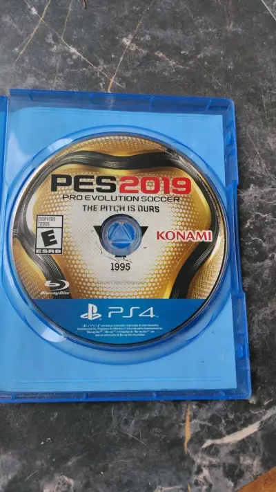 Lote de juegos PS4: Assassin's Creed Unity, The Evil Within 2, PES 2019, FIFA 15 - miniatura 3