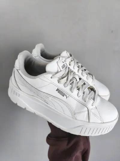 Zapatillas blancas Puma de cuero para mujer - miniatura 1