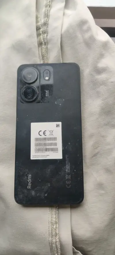 Teléfono Xiaomi Redmi con pantalla rota - miniatura 1