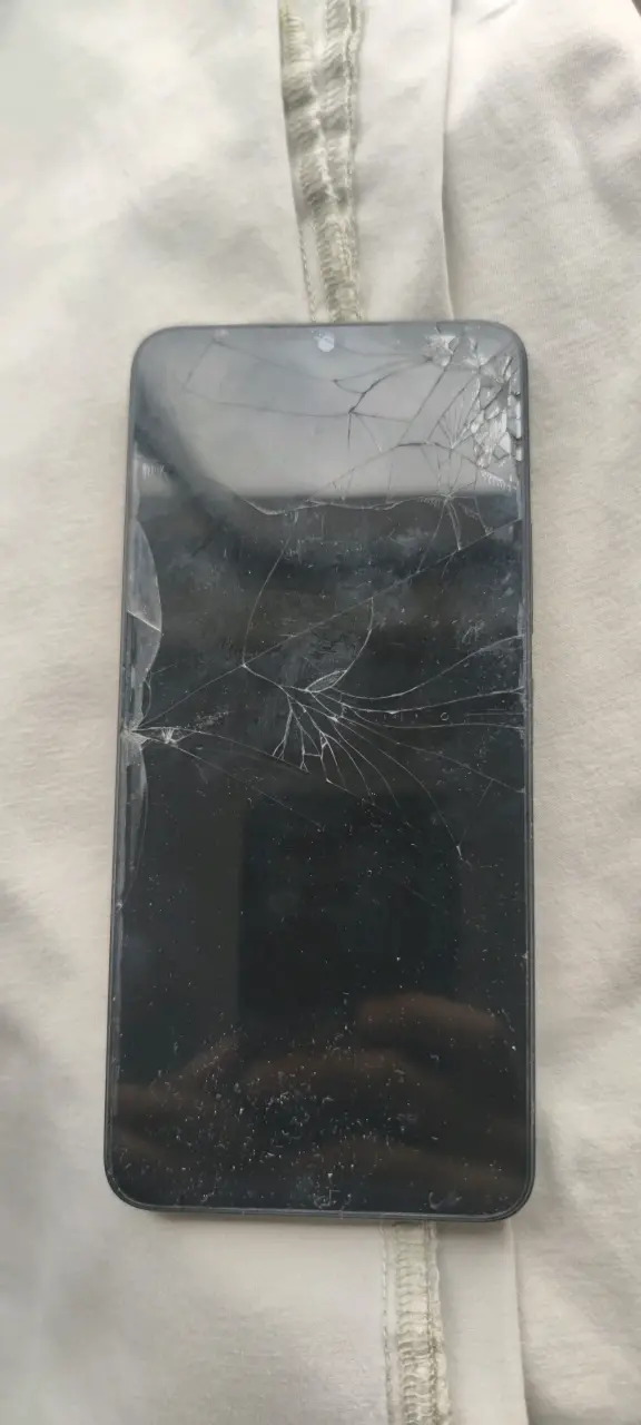 Teléfono Xiaomi Redmi con pantalla rota - 2