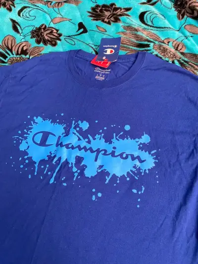 Polera azul Champion con diseño gráfico - miniatura 1