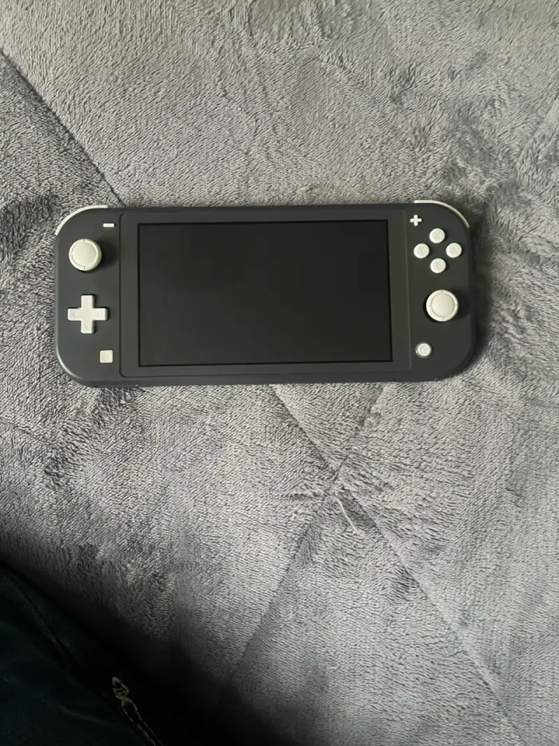 Nintendo Switch Lite gris en buen estado - 3