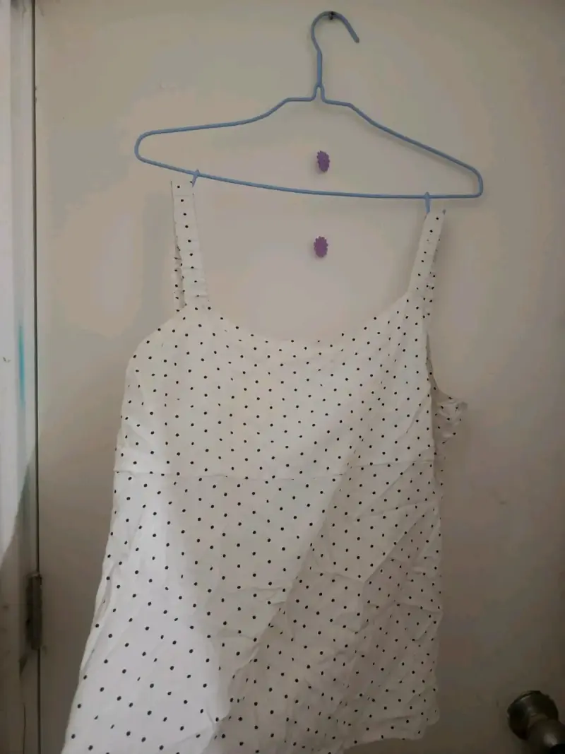 Blusa sin mangas de lunares Blu Girl