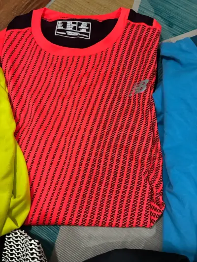 Lote 7  Poleras Deportivas Nike y The North Face - miniatura 4