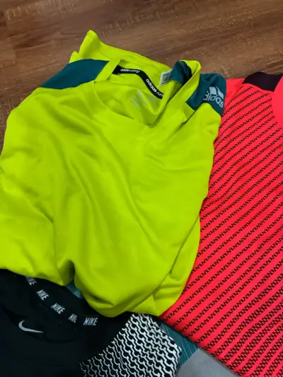 Lote 7  Poleras Deportivas Nike y The North Face - miniatura 6