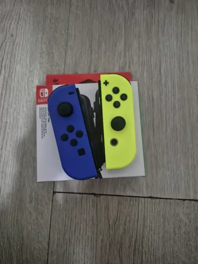 Joy-Con Nintendo Switch Azul y Amarillo - miniatura 2