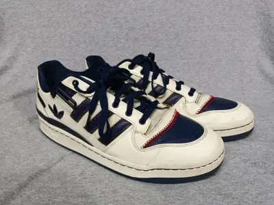 Zapatillas deportivas Adidas blancas y azules - miniatura 1